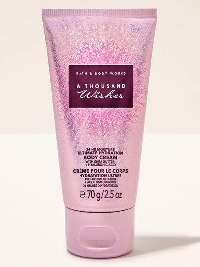 Cremă de corp Bath & Body Works A Thousand Wishes în tub roz cu efect strălucitor, 70 g.