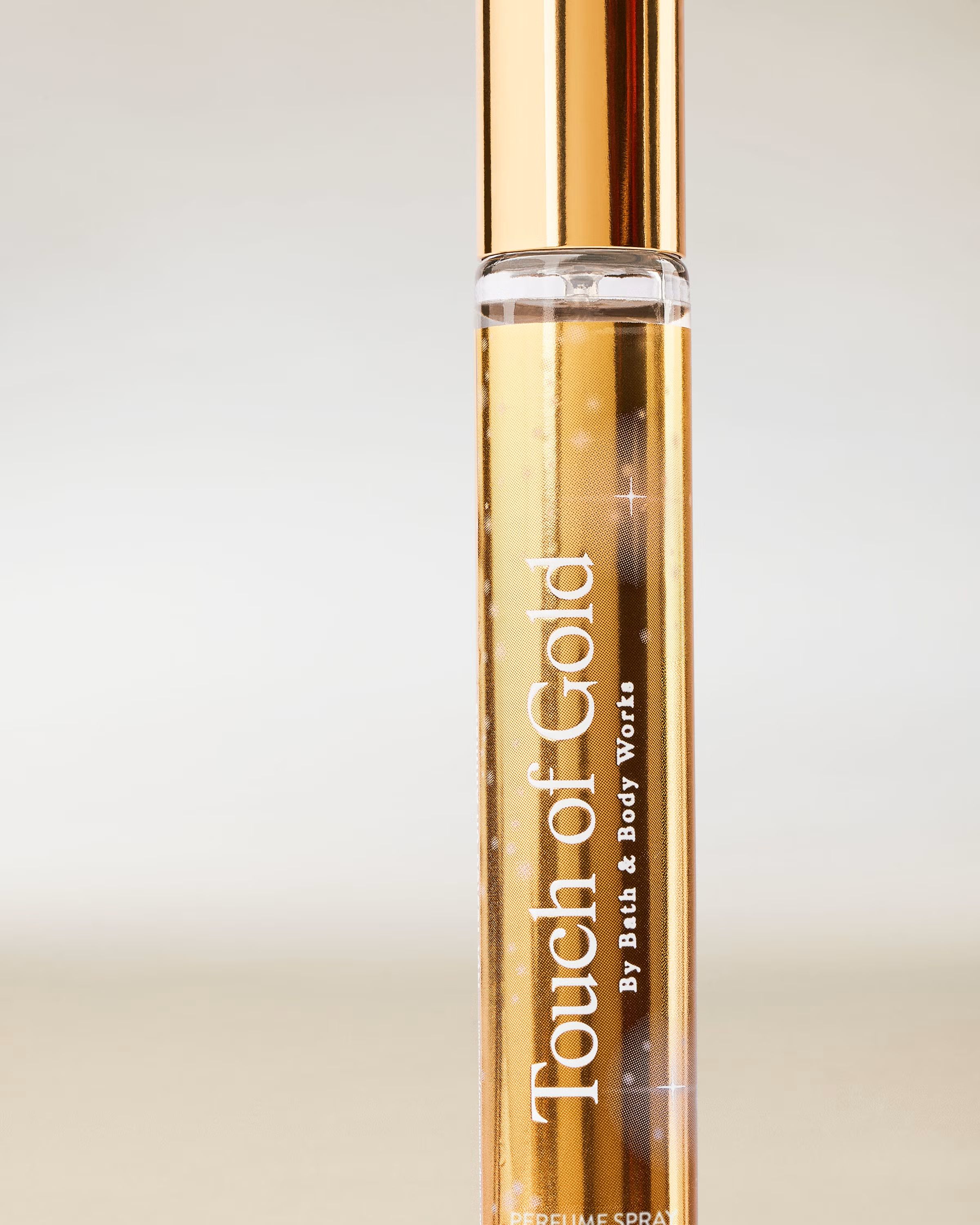 Touch of Gold – spray parfumat Bath & Body Works în sticlă aurie subțire din colecția Touch of Gold
