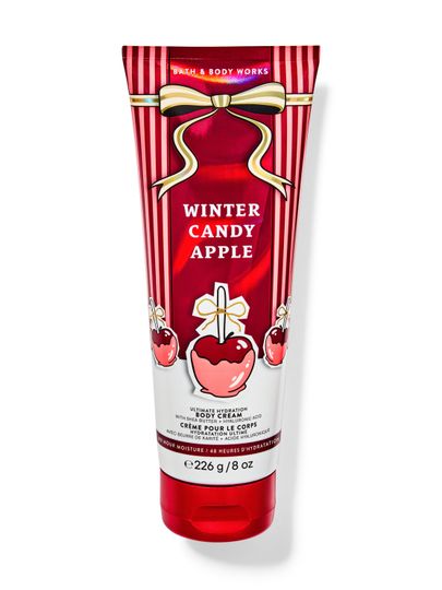 Cremă de corp Winter Candy Apple Bath & Body Works cu motiv de mere glazurate și fundă aurie