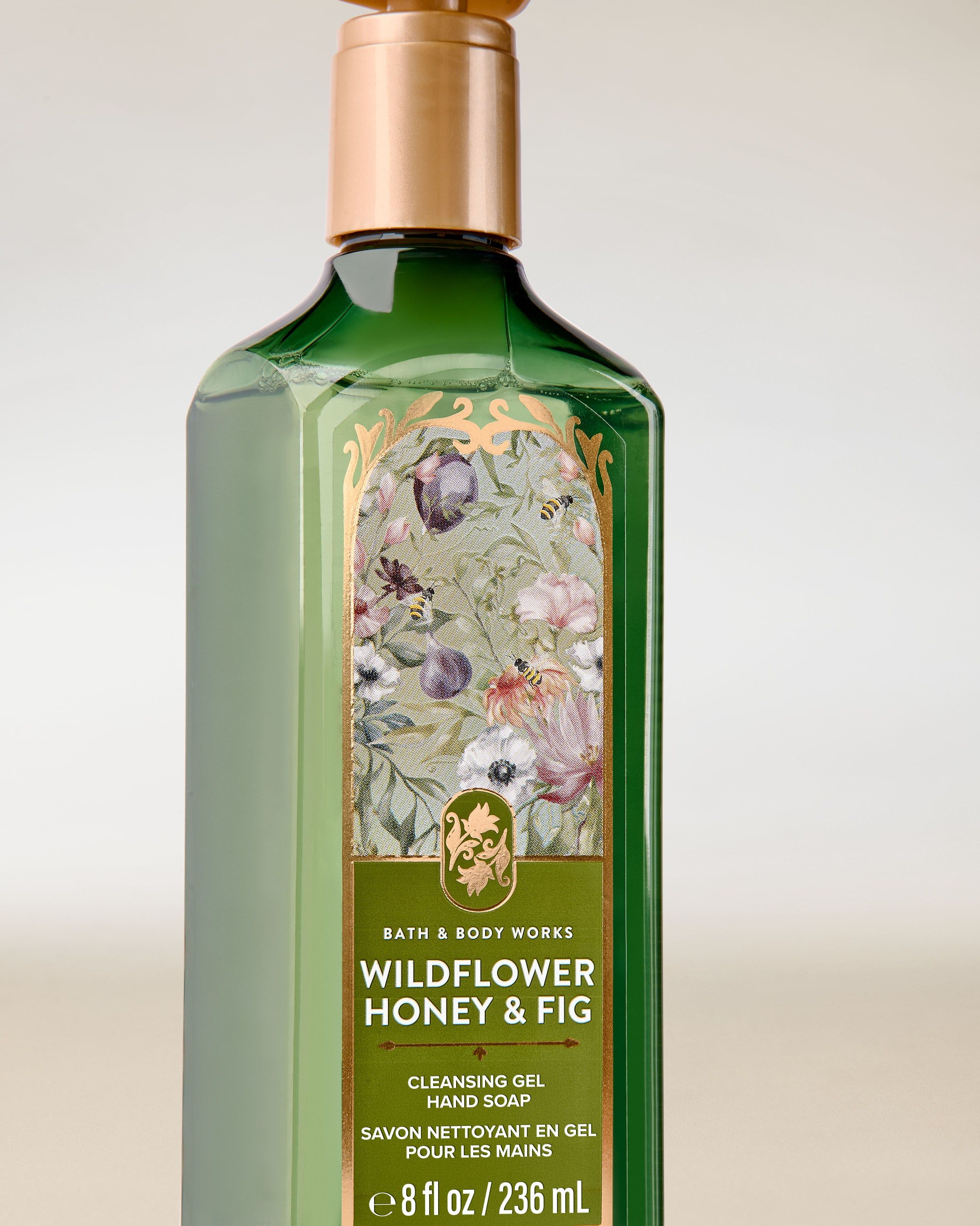 Bath & Body Works Wildflower Honey & Fig – gel pentru mâini în sticlă verde cu design floral.