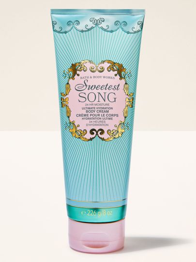 Cremă de corp Sweetest Song Bath & Body Works într‑un tub turcoaz cu etichetă decorativă