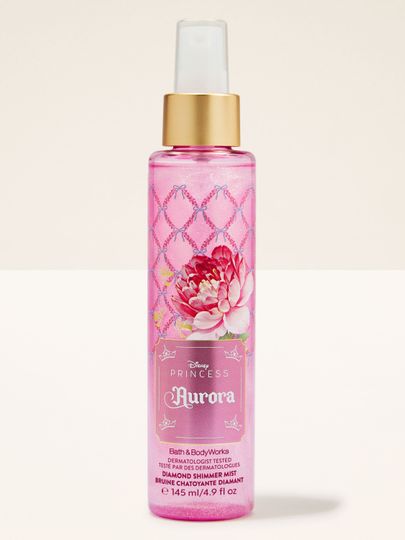 Aurora Diamond Shimmer Mist – sticlă roz strălucitoare cu particule shimmer și prospețime delicată.