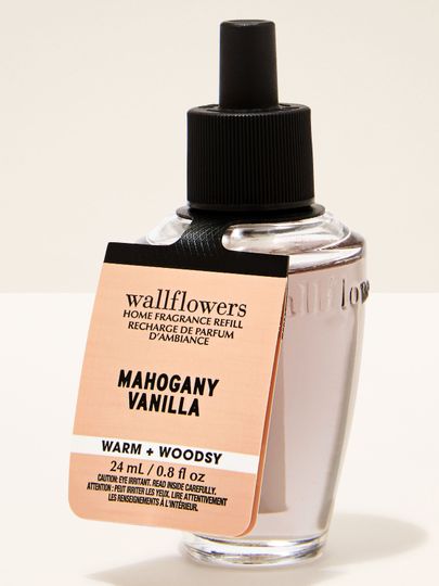 Reumplere Wallflowers Mahogany Vanilla, aromă caldă cu note lemnoase și vanilie, flacon deschis 24 ml.