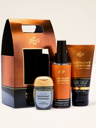 Setul cadou Mahogany Teakwood cu spray, cremă de corp și gel pentru mâini, prezentat într-un ambalaj practic, gata de oferit.