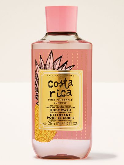 Gel de duș Costa Rica Pink Pineapple Sunrise în sticlă roz, cu etichetă tropicală și capac roz.