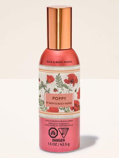 Bath & Body Works Poppy – spray concentrat pentru cameră într-un flacon roșu cu motiv floral de maci.