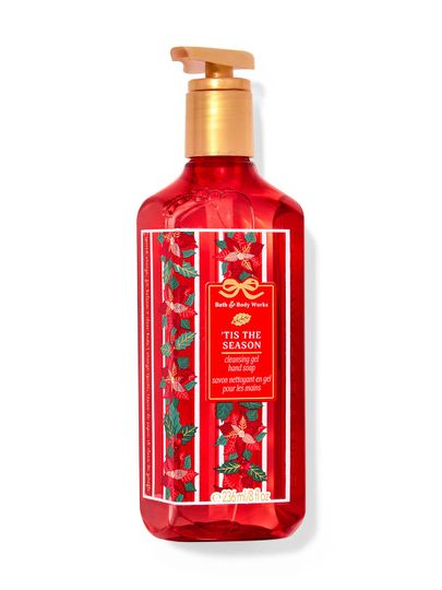 Červené gelové mýdlo na ruce „'Tis The Season“ s motivem pnoucích vánočních hvězd. Bath & Body Works.