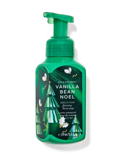 Zelené pěnivé mýdlo na ruce „Vanilla Bean Noel“ s motivy vánočních stromků a cesmíny. Bath & Body Works.