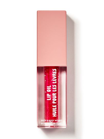 Ulei de buze Bath & Body Works "Bubblegum Pink" în ambalaj dreptunghiular cu lichid roz.